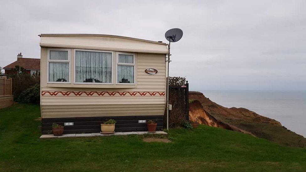 A caravan on the edge of the cliff