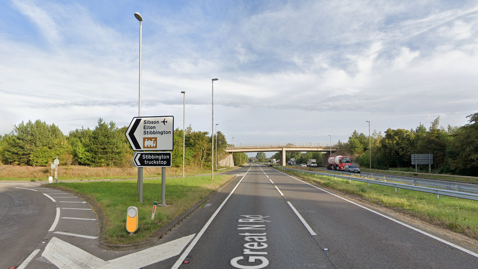 A1 with a sign signalling Stibbington truckstop