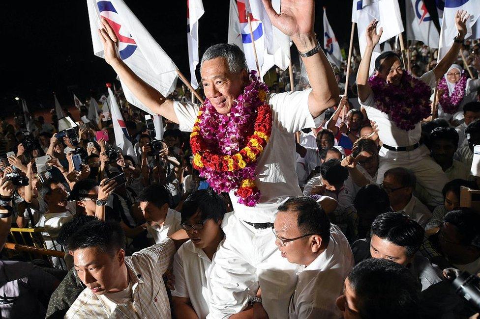 Singapore's Prime Minister Lee Hsien Loong, of the People's Action Party celebrates after winning the general election in Singapore on 12 September 2015