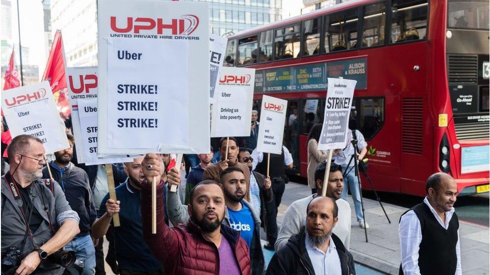 Uber drivers on strike in London in October demanding employment rights