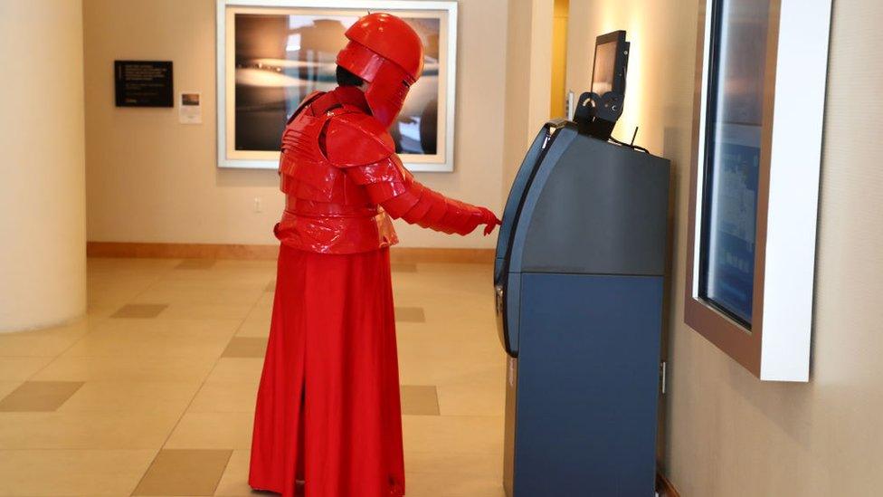 Praetorian-Guard-getting-money-from-a-cash-machine.