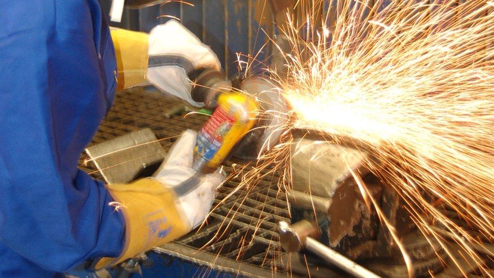 Angle grinder in use