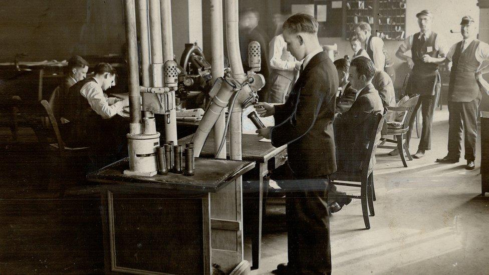 Man using a pneumatic tube