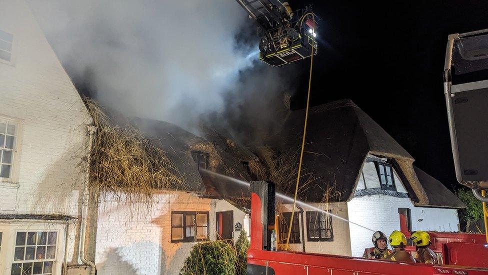 Firefighters tacking the Thame fire at night