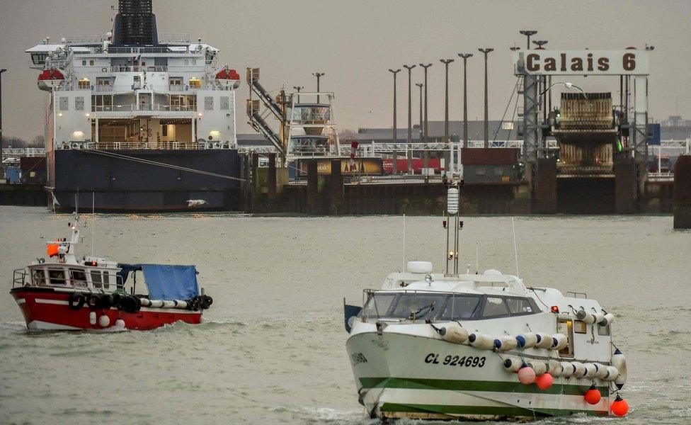 Fishing boats leave the harbour of Calais on January 25, 2018 to take part in a blockade to protest against electric pulse fishing