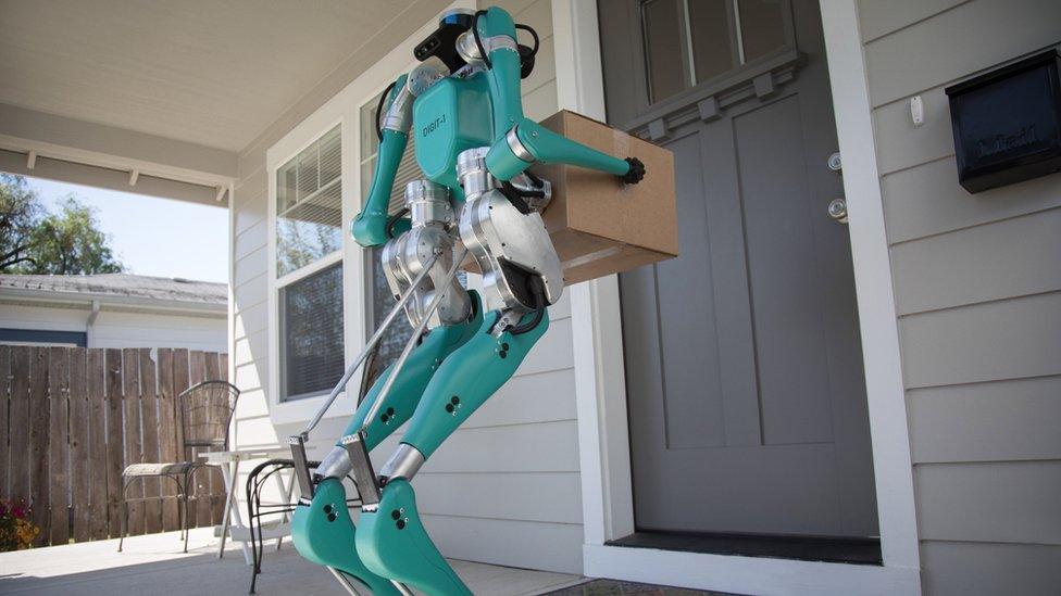 Two-legged-robot-delivering-to-house