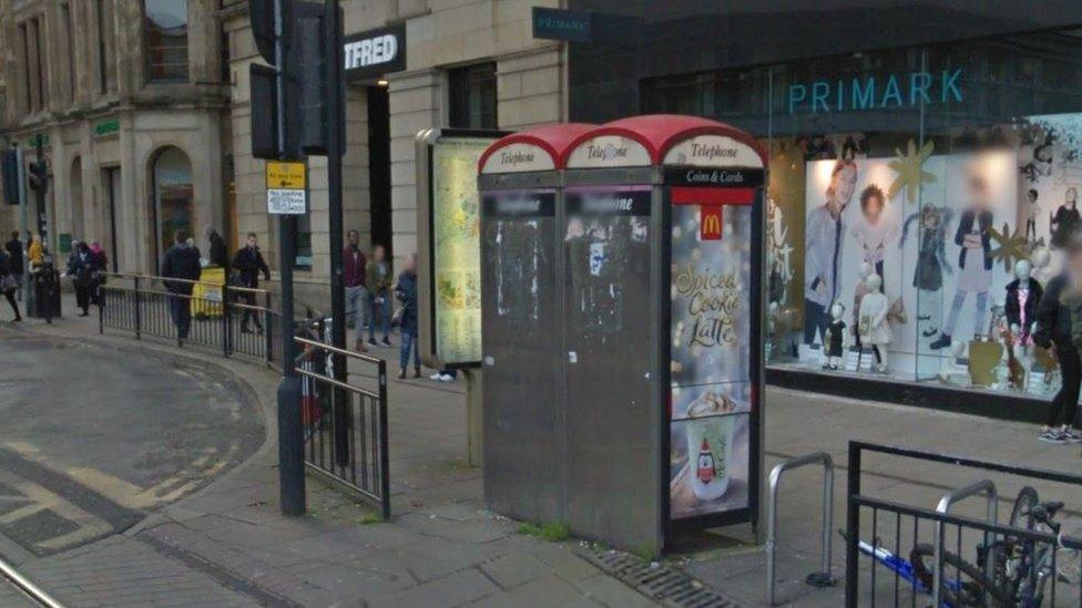 Telephone boxes in Piccadilly Gardens