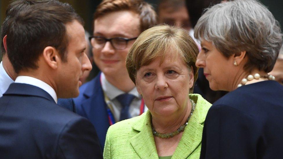 French President Emmanuel Macron (L), German Chancellor Angela Merkel and British Prime Minister Theresa May in Brussels, 22 Jun 17