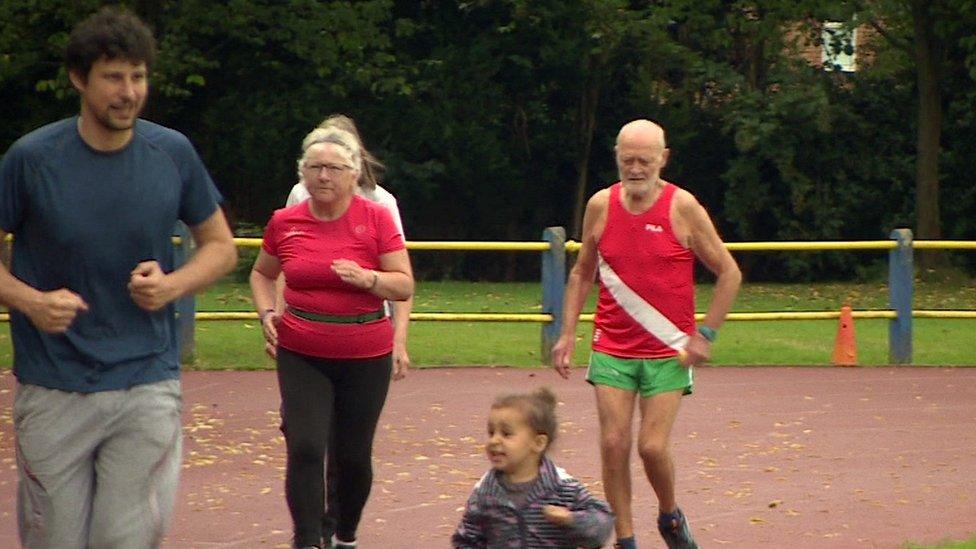 Arthur Walsham and other runners doing their laps