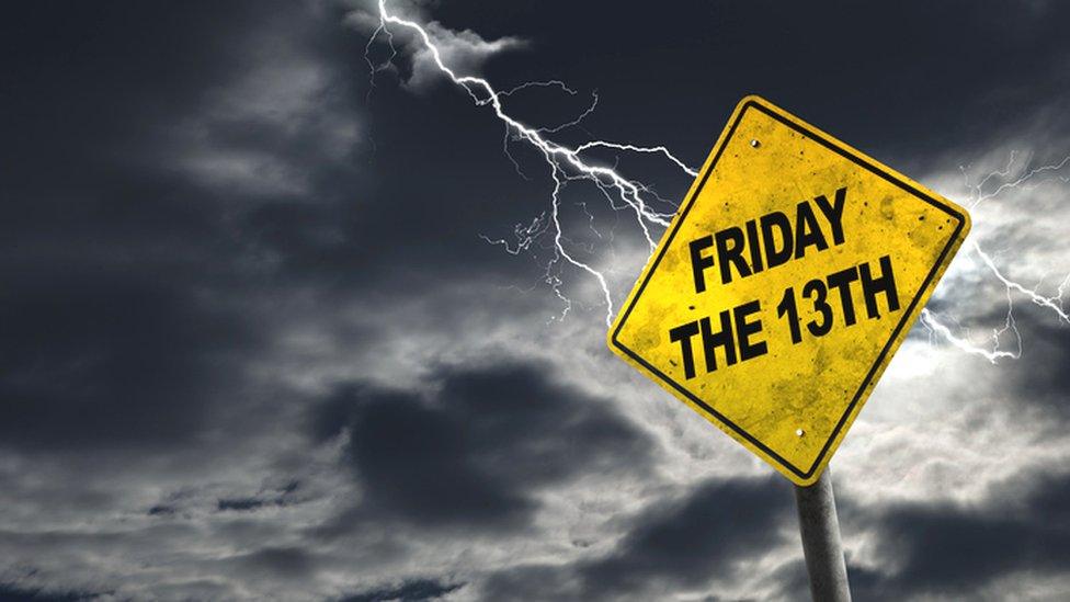 Friday 13th roadsign with lightning