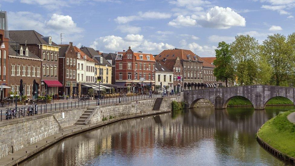 View of Meuse river with bridge in Roermond