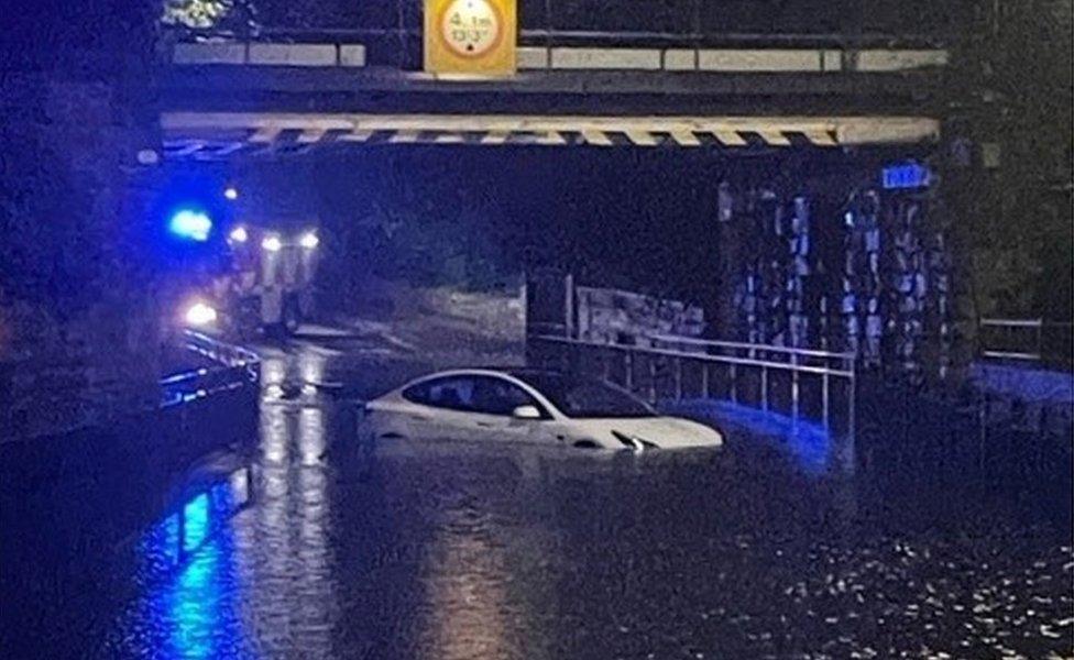 Car stuck in flood water in Tamworth Road, Ashby de la Zouch, Leicestershire