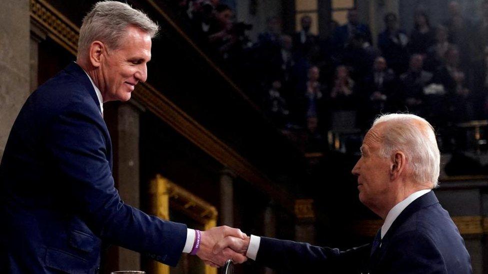 McCarthy and Biden shake hands at the State of the Union address