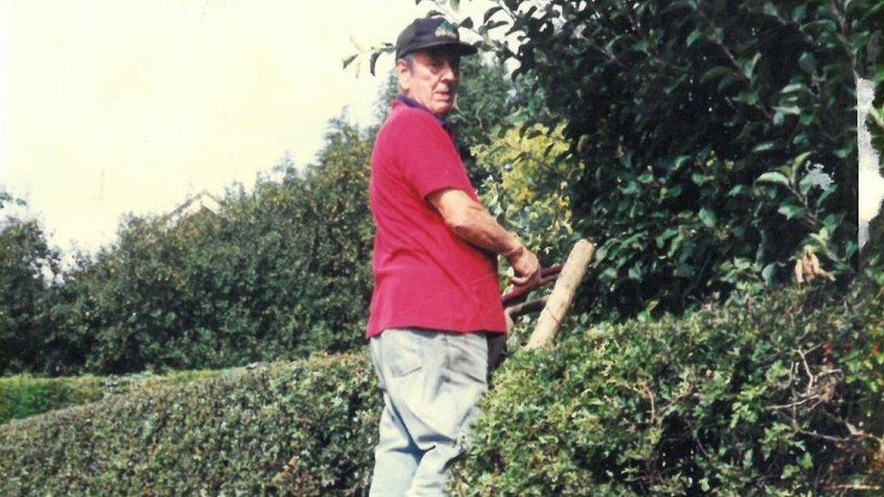 Jack Mansfield on a ladder