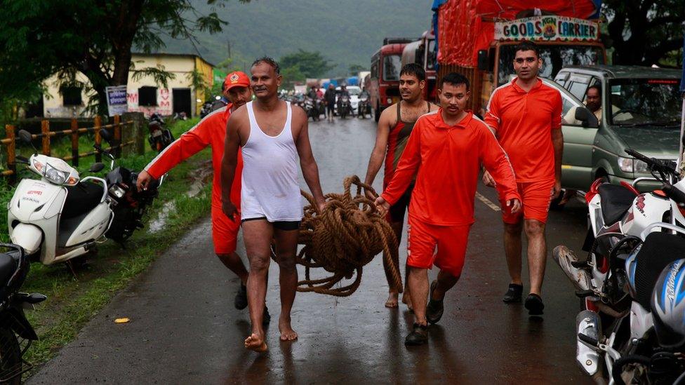 Rescue workers arrive to search for survivors