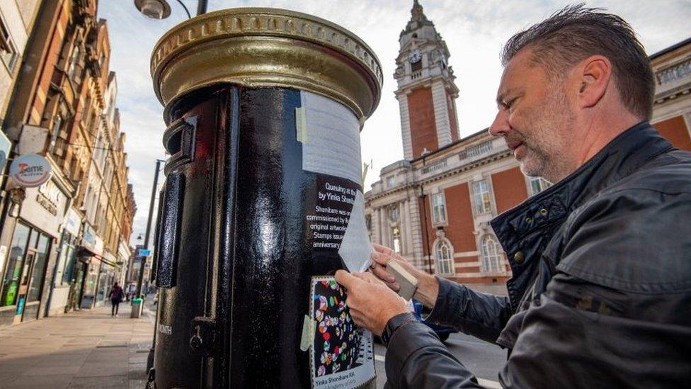 A black postbox