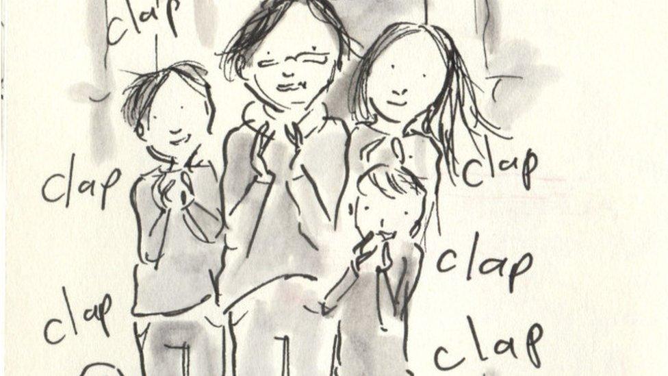 The family clapping NHS workers