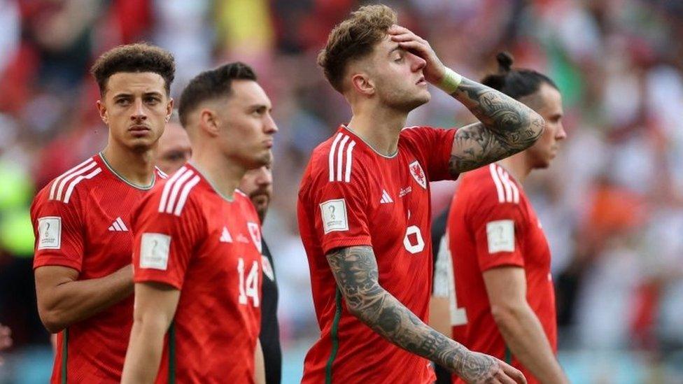 Wales's players looking dejected