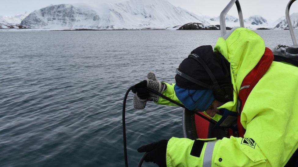 Researcher and sound artist Jana Winderen records with hydrophones in the Barents Sea