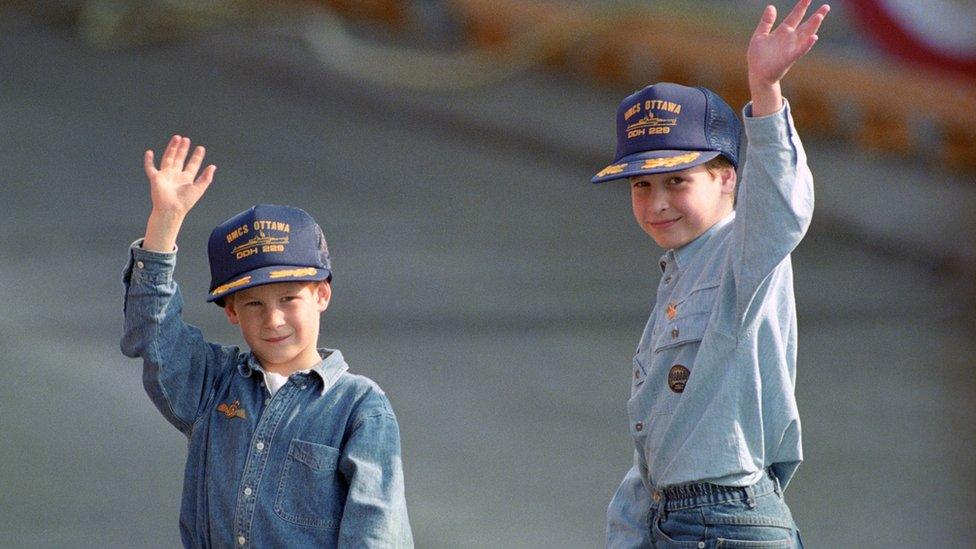 Young brothers in caps