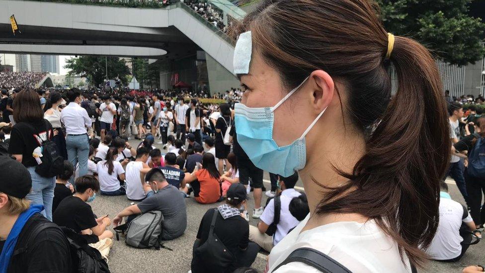 Young woman among the protesters