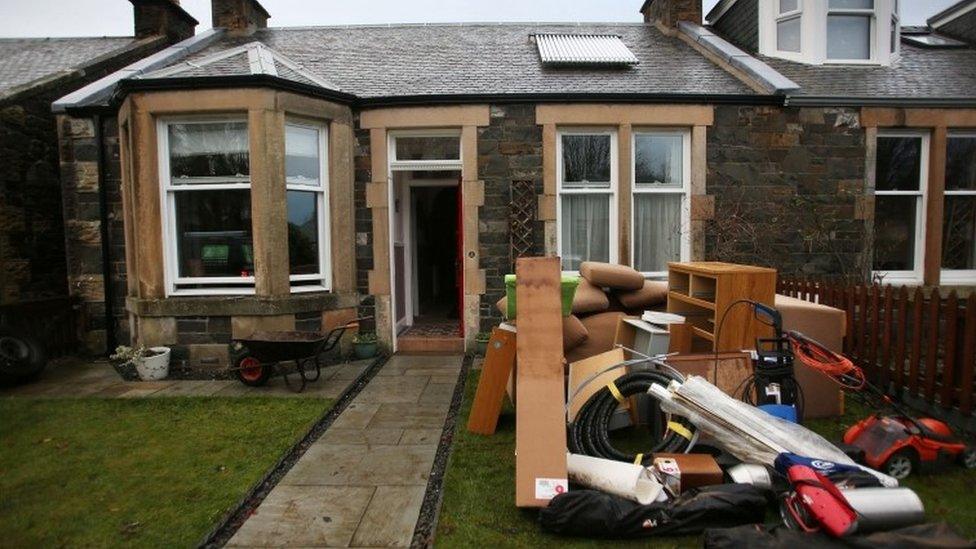 Belongings outside a house in Peebles