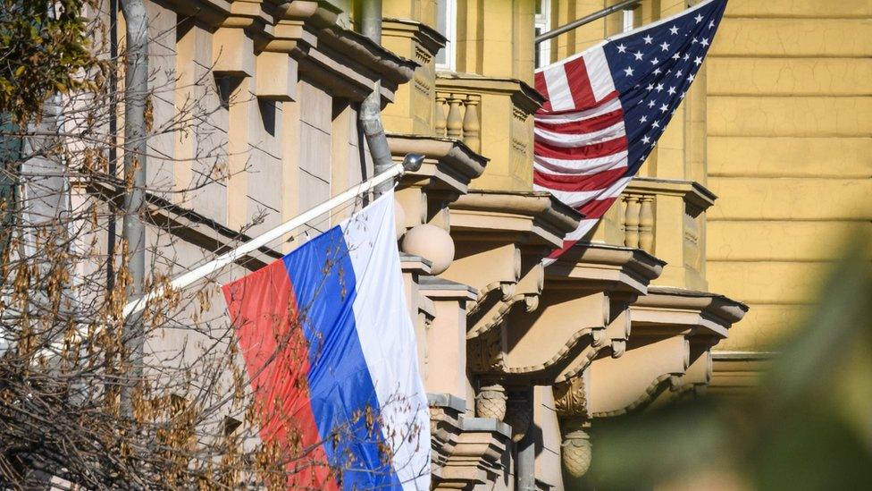 US and Russian flags side-by-side