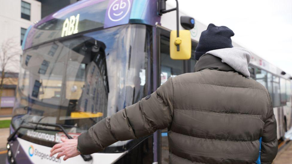 Self-driving bus passengers