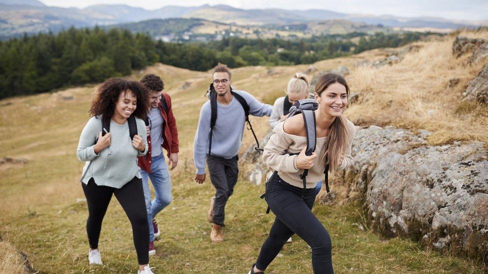 young people outdoors exploring