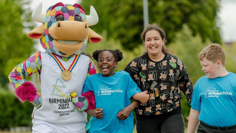 Pupils from Carrick Knowe Primary School in Edinburgh meet games mascot Perry