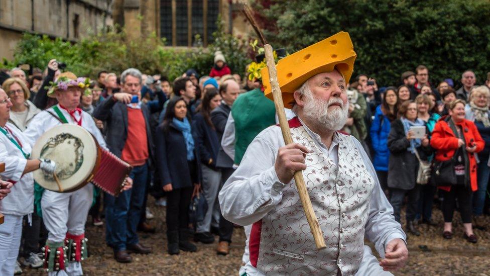 Oxford City Morris Men wearing a cheese hat