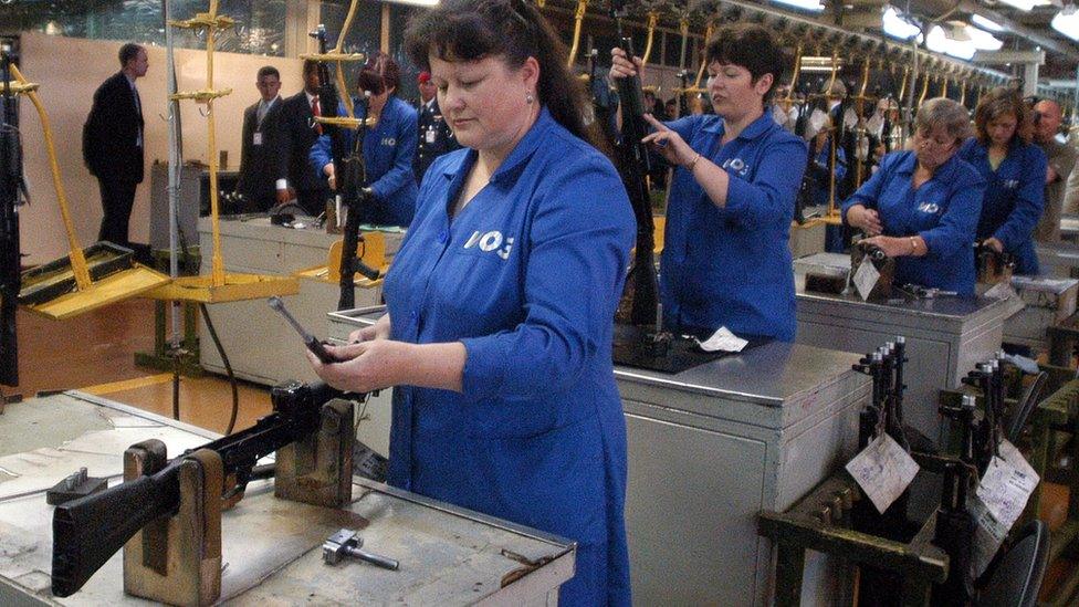 Workers assembling Kalashnikov rifles at the Izhmash weapons factory