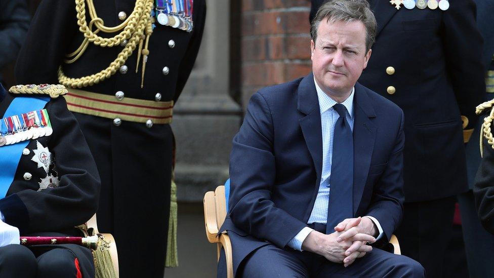 Prime Minister David Cameron watches parade during Armed Forces Day at Cleethorpes, England, Saturday June 25, 2016