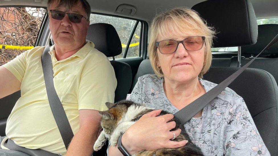 Trudi and David Calver with their cat