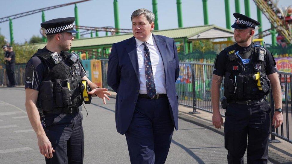 Kit Malthouse and two Essex police officers in Southend