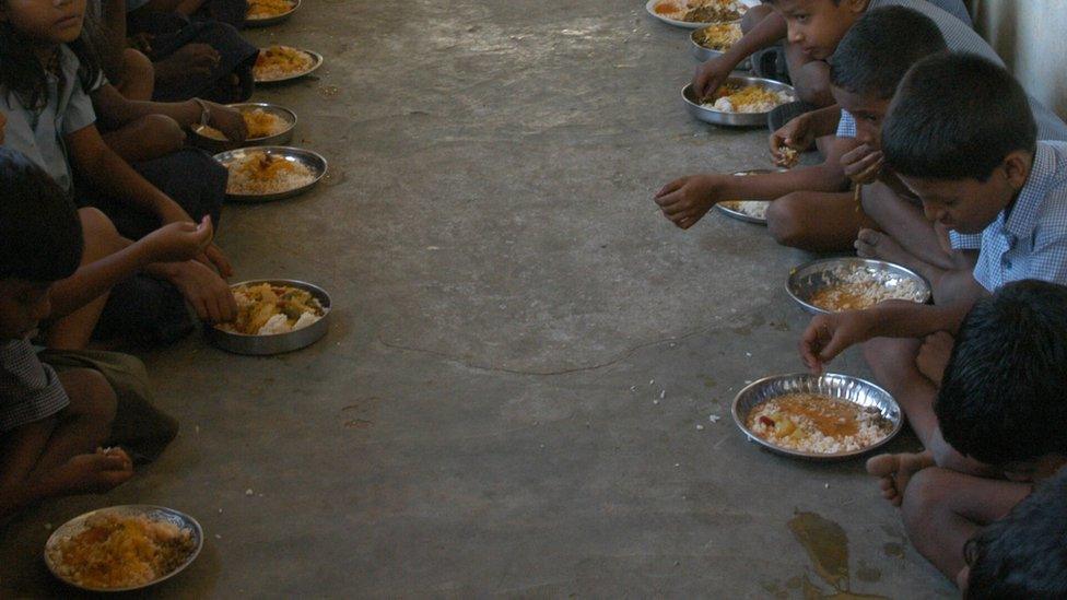 Distributing Mid Day Meal to Primary School students (Corporation School Children) in Chennai, Tamil Nadu, India