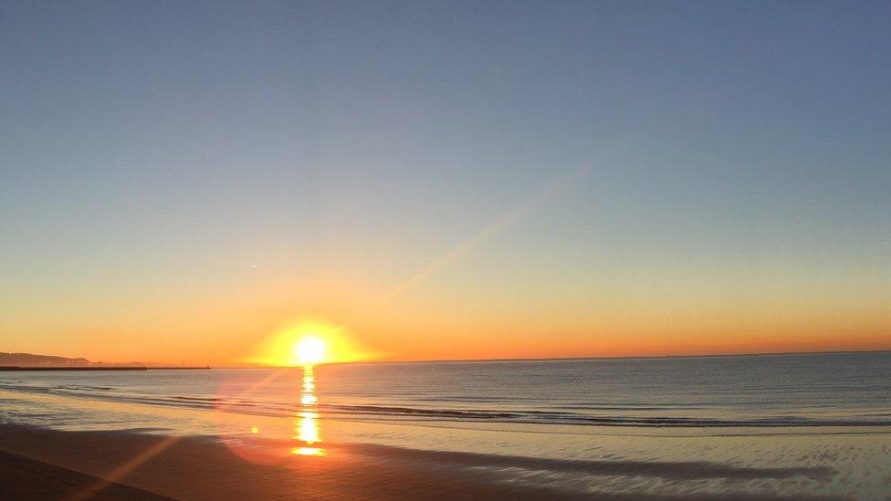 Matthew Stonham's glorious shot of the sunrise over a crisp yet chilly Swansea Bay