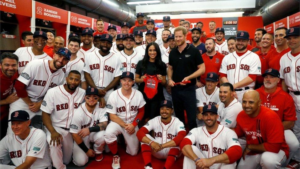 Not wanting to pick favourites, the couple also posed for a group photo with the Boston Red Sox