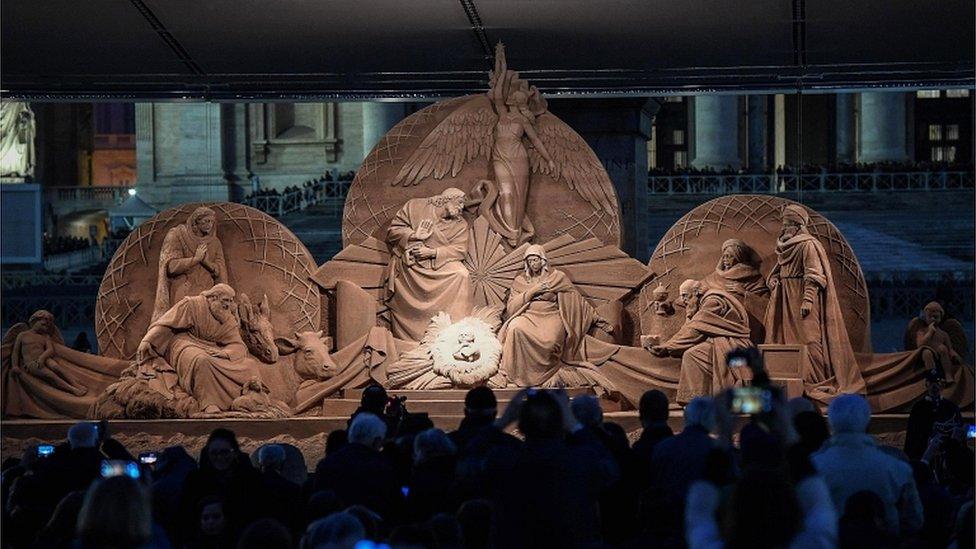 The Vatican nativity Scene, sculpted from sand, is inaugurated at St Peter's Square in Vatican City on 7 December 2018