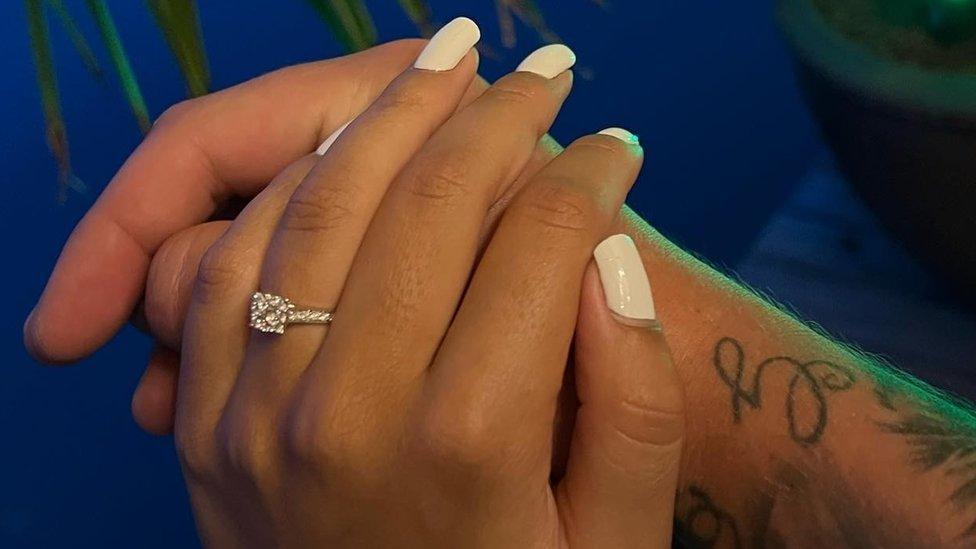 New engagement ring on finger