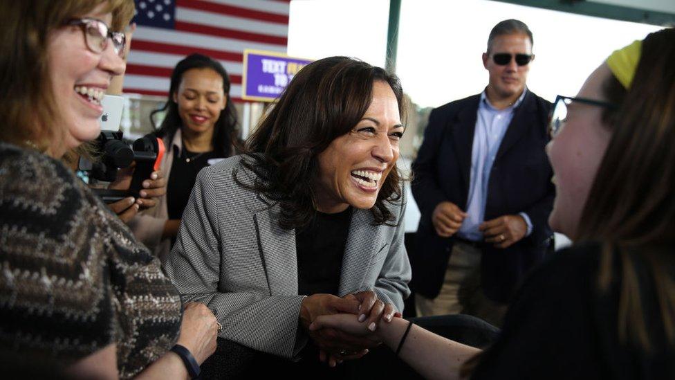 Kamala Harris greets supporters at a campaign rally