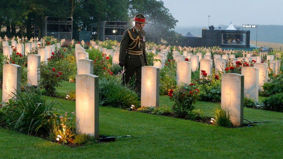 New Zealand Army Chief, Peter Kelly, walks through gravestones at Thiepval Memorial, northern France.