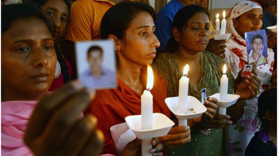 Relatives of Indian workers missing in Iraq pose at a church in Amritsar on June 26, 2014.