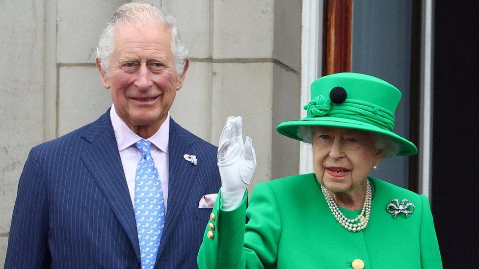 The Queen waving to the crowds next to Charles, who is now King, during the Platinum Jubilee