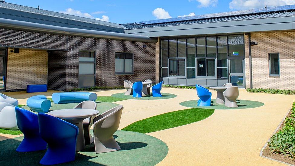 Courtyard with tables and chairs