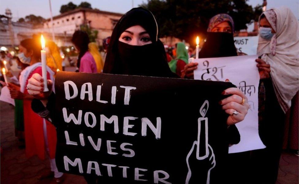 Indian activists protest against an alleged gang rape of a 19 years old Dalit girl in Uttar Pradesh state, in Bhopal,