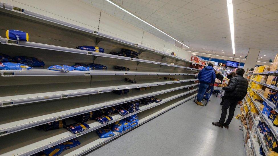 Empty shelves at supermarket as people stockpile due to the fear of the new coronavirus in Palermo, Italy, 25 February 2020. Italian authorities say that there more than 200 confirmed cases of COVID-19 disease were registered in the country, with at least seven deaths. Precautionary measures and ordinances to tackle the spreading of the deadly virus included the closure of schools, gyms, museums and cinemas in the affected areas in northern Italy. EPA/Igor Petyx