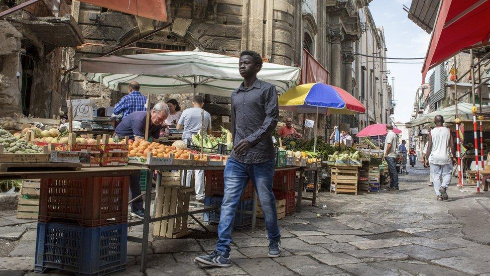 A man walking in Palermo, Sicily - Italy