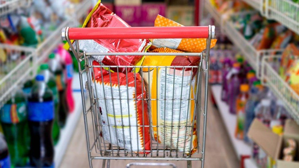 Supermarket trolley full of multi-packs