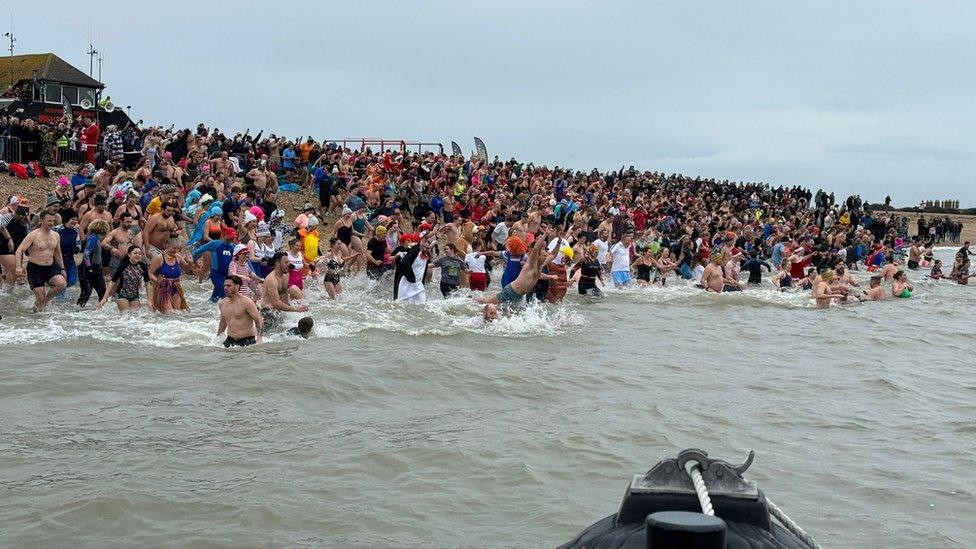 Hundreds of people brave the cold for the New Year's Day dip at Gosport